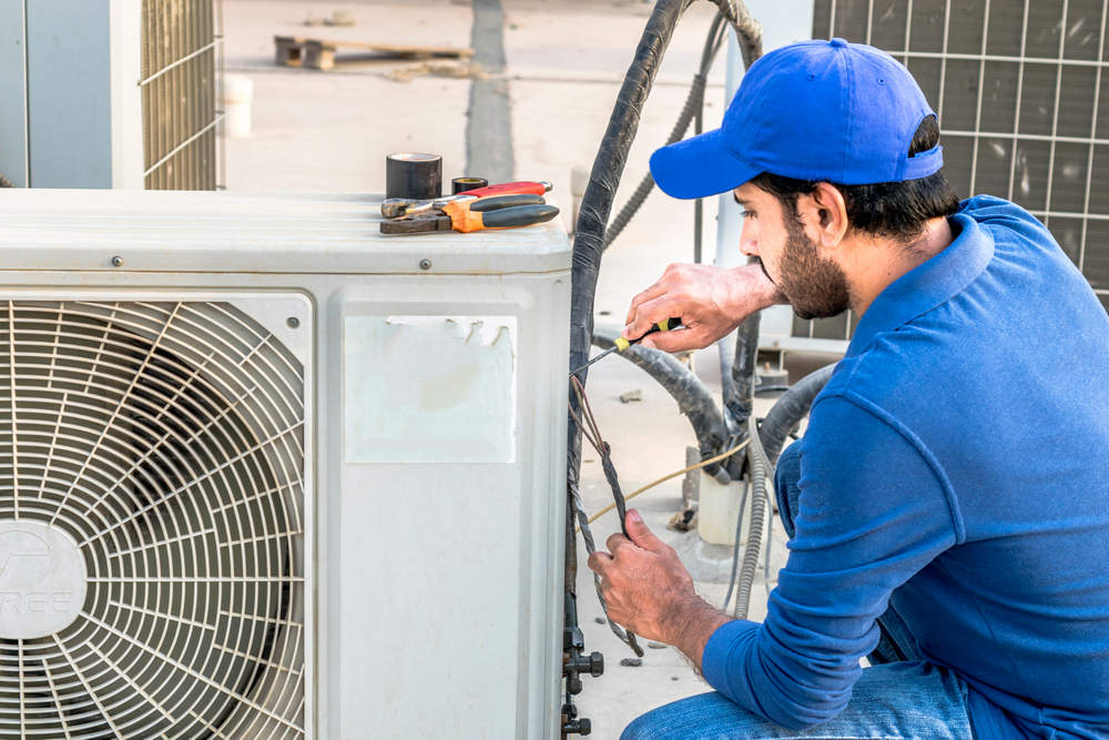 Repair or Replace Your AC? Key Signs and AC Servicing Tips